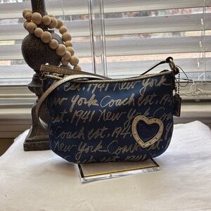 Coach Blue and Gold Script Wristlet